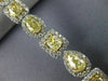 LARGE 11.36CT WHITE & FANCY YELLOW DIAMOND 18KT TWO TONE GOLD 3D TENNIS BRACELET