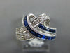 1.49CT DIAMOND & AAA SAPPHIRE 14KT WHITE GOLD 3D ROUND & BAGUETTE LOVE KNOT RING