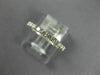 1.03CT DIAMOND 18KT WHITE GOLD 3D ROUND SHARE PRONG ETERNITY ANNIVERSARY RING