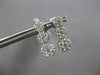 1.0CT DIAMOND 14KT WHITE GOLD 3D MULTI FLOWER JOURNEY SCREWBACK HANGING EARRINGS