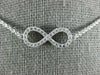 ESTATE .40CT DIAMOND 18KT WHITE GOLD 3D CLASSIC INFINITY LOVE NECKLACE