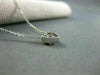 ESTATE .18CT DIAMOND 14KT WHITE GOLD 3D SIX STONE ETOILE HEART PENDENT #1722