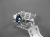 ESTATE .90CT DIAMOND & AAA TANZANITE 14KT WHITE GOLD CLUSTER COCKTAIL RING