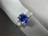 1.63CT ROUND DIAMOND & AAA OVAL TANZANITE 14K WHITE GOLD 3 STONE ENGAGEMENT RING