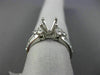 ESTATE .92CT DIAMOND ROUND & BAGUETTE 18KT WHITE GOLD SEMI MOUNT ENGAGMENT RING