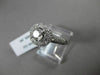 ESTATE 1.20CT DIAMOND 14KT WHITE GOLD 3D HALO TWO ROW ROUND ENGAGEMENT RING