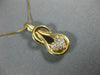 ESTATE .25CT DIAMOND 14KT YELLOW GOLD HEART LOVE KNOT INFINITY FLOATING PENDANT