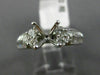 ESTATE .92CT DIAMOND ROUND & BAGUETTE 18KT WHITE GOLD SEMI MOUNT ENGAGMENT RING