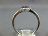 .70CT DIAMOND & AAA AMETHYST 14KT WHITE GOLD TRILLION & ROUND CRISS CROSS RING
