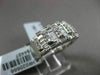 ESTATE WIDE 1.24CT BAGUETTE & ROUND DIAMOND 18KT WHITE GOLD ANNIVERSARY RING
