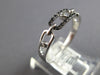 ESTATE .09CT WHITE & BLACK DIAMOND 14KT WHITE GOLD 3D OVAL LOVE KNOT FUN RING