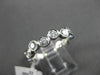 ESTATE .75CT ROUND DIAMOND 14KT WHITE GOLD WAVE BEZEL ETOILE ANNIVERSARY RING