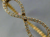 ESTATE .70CT DIAMOND 14KT ROSE GOLD 3D INFINITY FLEXIBLE LOVE BANGLE BRACELET