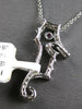 ESTATE .33CT DIAMOND & AAA RUBY 14KT WHITE GOLD HAPPY SEAHORSE FLOATING PENDANT