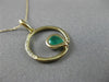 ESTATE .03CT DIAMOND & AAA EMERALD 14KT YELLOW GOLD CIRCLE OF LIFE FUN PENDANT