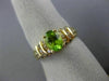 ESTATE 1.08CT ROUND DIAMOND & AAA OVAL PERIDOT 14KT YELLOW GOLD ENGAGEMENT RING