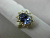 1.83CT DIAMOND & AAA OVAL TANZANITE 14KT YELLOW GOLD FLOWER HALO ENGAGEMENT RING