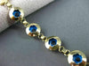 ESTATE 14KT YELLOW GOLD & ROUND BLUE CRYSTAL FLORAL EVIL EYE BRACELET #22954