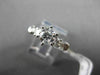 ESTATE 1.12CT ROUND & BAGUETTE DIAMOND 14KT WHITE GOLD SOLITAIRE ENGAGEMENT RING