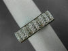 ESTATE .60CT DIAMOND 18KT WHITE GOLD ROUND & PRINCESS INVISIBLE ANNIVERSARY RING