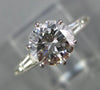 ESTATE 1.17CT DIAMOND PLATINUM 3D ROUND AND BAGUETTE 3 STONE ENGAGEMENT RING