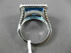 ESTATE 11.42CTW DIAMOND & AAA EMERALD CUT BLUE TOPAZ 14KT WHITE GOLD HALO RING