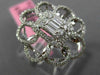 ESTATE LARGE .78CT ROUND & BAGUETTE DIAMOND 18KT WHITE GOLD FLOWER COCKTAIL RING