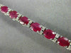 ESTATE WIDE 12.22CT DIAMOND & RUBY 18K WHITE GOLD CLASSIC OVAL TENNIS BRACELET