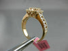 ESTATE LARGE 1.13CT ROUND & BAGUETTE DIAMOND 18KT ROSE GOLD HALO ENGAGEMENT RING