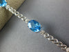 8.14CT DIAMOND & AAA BLUE TOPAZ 14KT WHITE GOLD 3D OVAL & ROUND TENNIS BRACELET