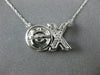 ESTATE .15CT DIAMOND 14K WHITE GOLD 3D DANCING DIAMOND XO FLOATING LOVE NECKLACE
