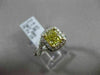 ESTATE 1.82CTW GIA FANCY YELLOW DIAMOND 18KT WHITE GOLD HALO ENGAGEMENT RING