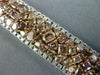 WIDE 22.84CT WHITE & PINK DIAMOND 18KT WHITE & ROSE GOLD CLUSTER TENNIS BRACELET