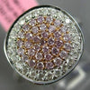 ESTATE WIDE .61CT WHITE & PINK DIAMOND 18KT WHITE & ROSE GOLD ROUND CLUSTER RING