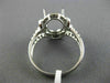 ESTATE LARGE .80CT DIAMOND 14KT WHITE GOLD OVAL HALO SEMI MOUNT ENGAGEMENT RING