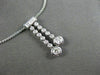 ESTATE .60CT DIAMOND 18KT WHITE GOLD 3D BEZEL JOURNEY SOLITARE FLOATING PENDANT