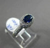 ESTATE 1.03CT DIAMOND & AAA SAPPHIRE 18KT WHITE GOLD HALO DESIGN ENGAGEMENT RING