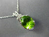 ESTATE 2.79CT DIAMOND & AAA PERIDOT 14KT WHITE GOLD 3D BOW OVAL FLOATING PENDANT