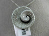 ESTATE LARGE 1.34CT DIAMOND & ONYX 18KT WHITE GOLD SWIRL SHELL FLOATING PENDANT