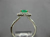 ESTATE .74CT DIAMOND & AAA EMERALD 18KT 2 TONE GOLD DOUBLE HALO ENGAGEMENT RING