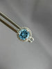 ESTATE 1.17CT DIAMOND & AAA BLUE TOPAZ 14KT WHITE GOLD ROUND HALO STUD EARRINGS