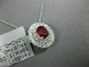 ESTATE .68CT DIAMOND & AAA RUBY 18KT WHITE GOLD OVAL DOUBLE HALO CLASSIC PENDANT