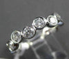 ESTATE .75CT ROUND DIAMOND 14KT WHITE GOLD WAVE BEZEL ETOILE ANNIVERSARY RING