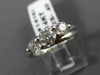 ESTATE .91CT DIAMOND 14KT WHITE GOLD 3D PAST PRESENT FUTURE TENSION RING #14161