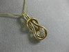 ESTATE .25CT DIAMOND 14KT YELLOW GOLD HEART LOVE KNOT INFINITY FLOATING PENDANT