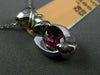 ESTATE .85CT DIAMOND & PINK SAPPHIRE 14KT WHITE GOLD SEMI BEZEL X LOVE PENDANT