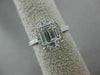 ESTATE LARGE .69CT ROUND & BAGUETTE DIAMOND 18KT WHITE GOLD OVAL ENGAGMENT RING