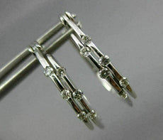 ESTATE .20CT DIAMOND 14KT WHITE GOLD 3D TWO ROW ETOILE OVAL HOOP EARRINGS