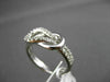ESTATE .33CT DIAMOND 14KT WHITE GOLD PAVE LOVE KNOT BELT COCKTAIL RING F/G VSSI
