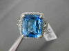 ESTATE 6.43CTW DIAMOND & AAA EXTRA FACET BLUE TOPAZ 14KT WHITE GOLD HALO RING